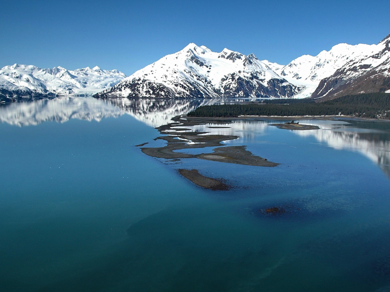 Alaska snow capped mountain blue water