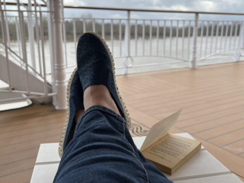 Relaxing outside of my stateroom on the American Queen cruise