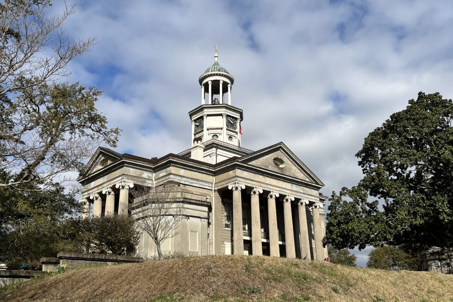 Vicksburg old courthouse sits on a hill under blue skies